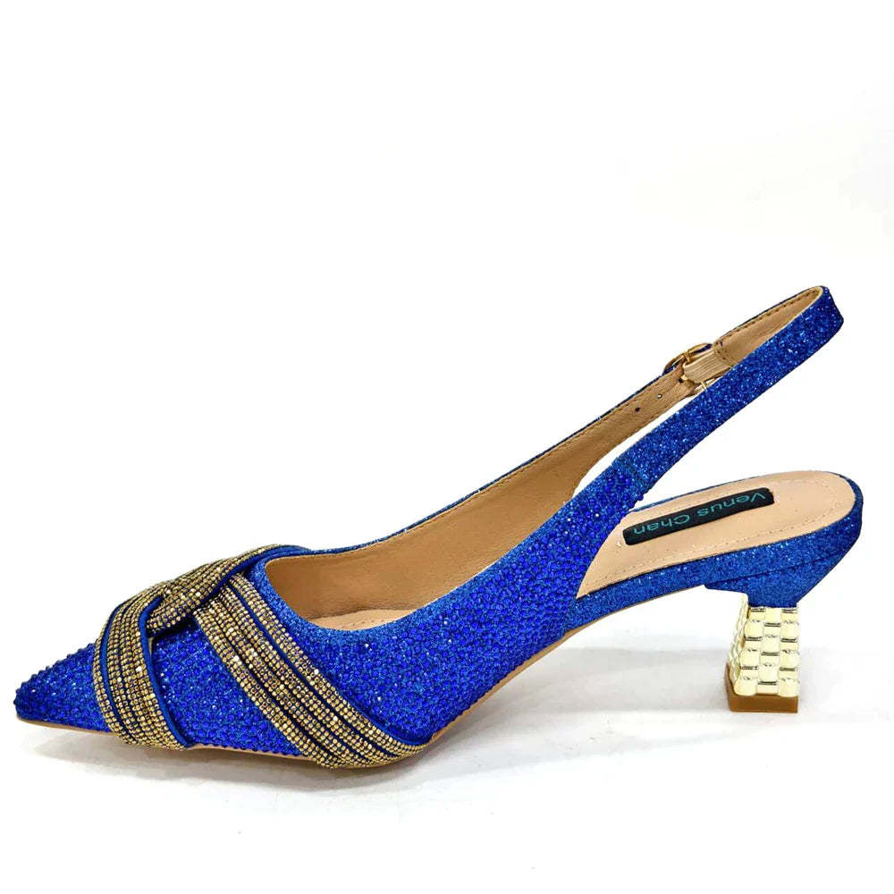 Elegant high-quality orange African women's shoes with a luxurious design, featuring a stunning butterfly-knot and crystal embellishments, ideal for weddings and formal parties.