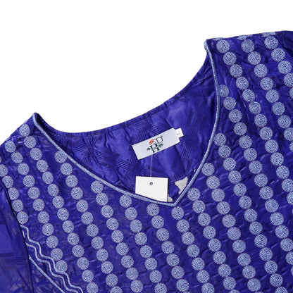 Model showcasing the H&D African Wedding Gown in an opulent setting, perfect for glamorous events and cultural celebrations.