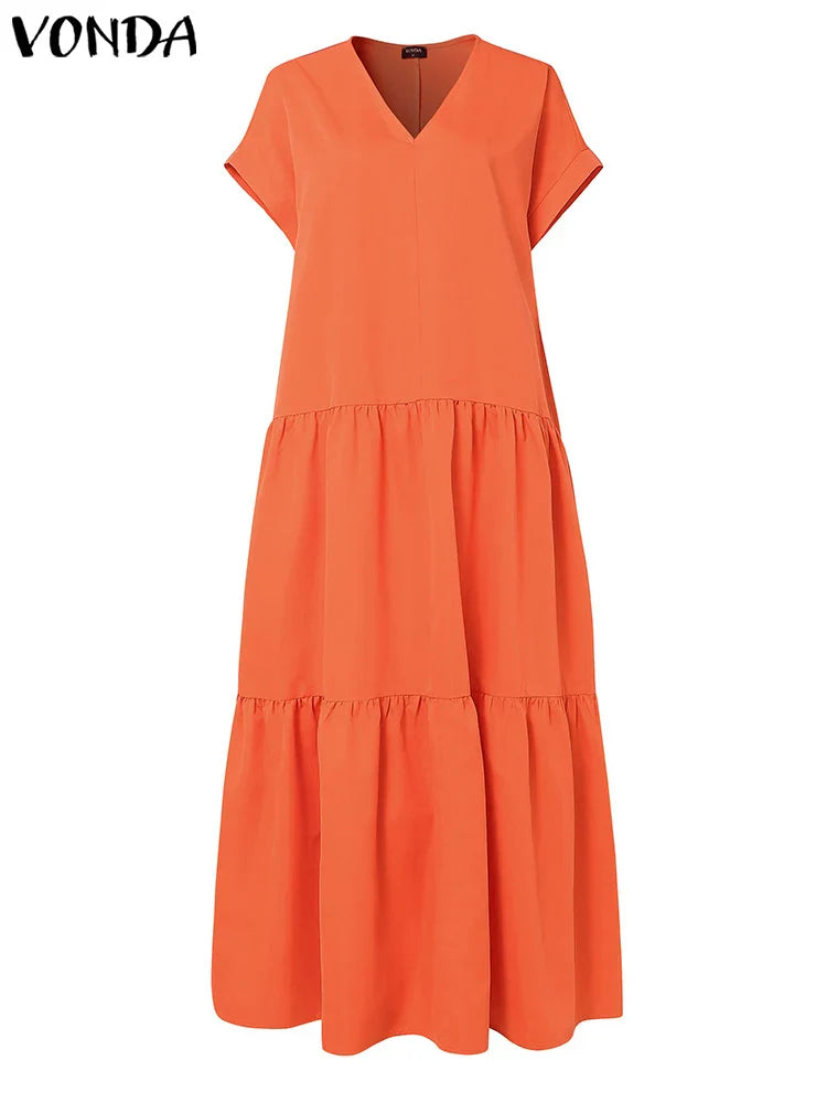 Luxurious floor-length plus size sundress perfect for summer, featuring a flattering V-neckline and comfortable fit for al fresco occasions.