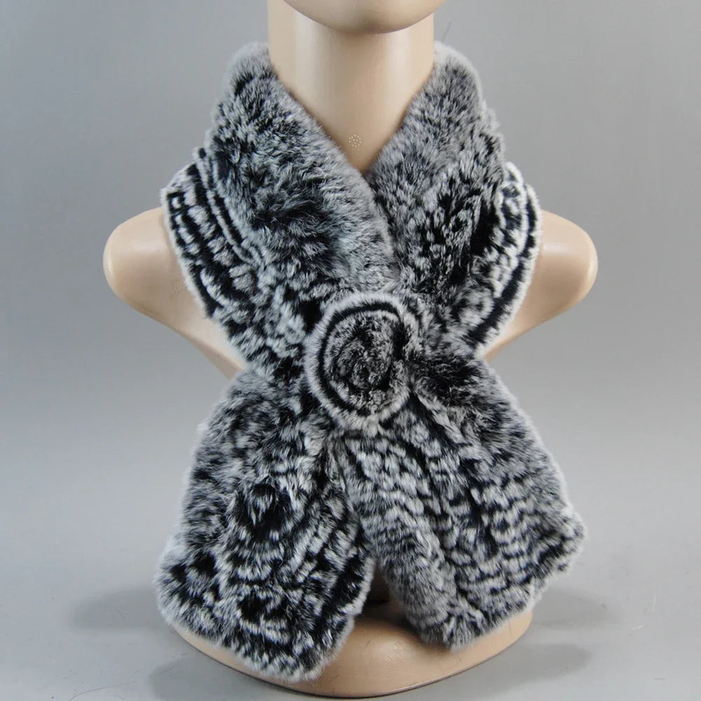 Close-up view of women's luxurious knit faux fur hat, highlighting its intricate design and premium materials, ideal for winter fashion.