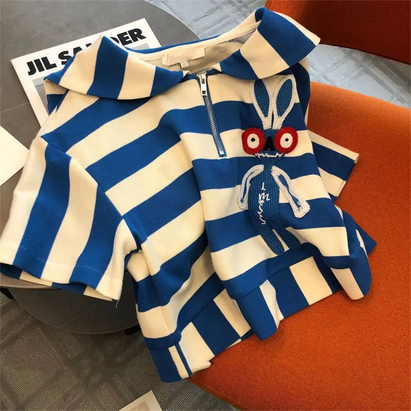 Model wearing the Elegant Women's Casual Striped Two-Piece Sportswear Set, stylishly paired for a fashionable summer look, ideal for office or leisure.