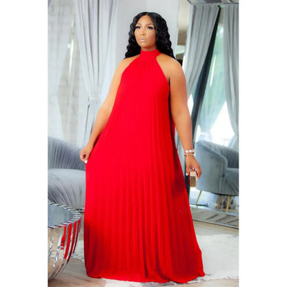 Luxurious floor-length evening dress for plus size women, featuring a flattering pleated design suitable for formal events.