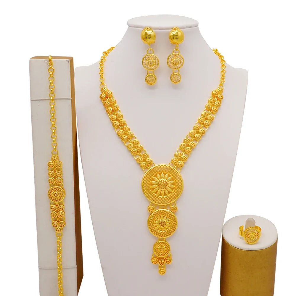 Luxurious Dubai gold coloured bridal jewelry set for women featuring an elegant necklace with intricate African design.