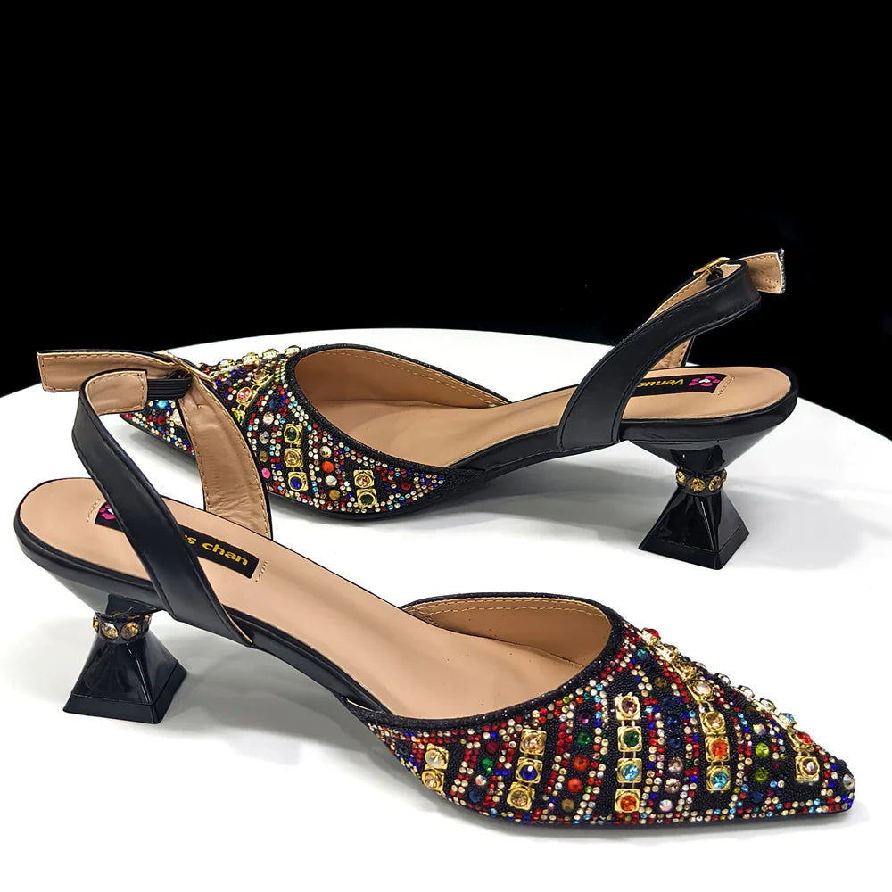 Close-up of high-heeled women's pumps with pointed toe design and sparkly rhinestone embellishments, exuding a sophisticated summer style.