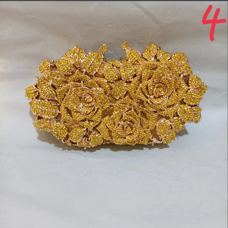 Fashion-forward women's evening handbag made from exquisite metallic material, adorned with brilliant crystals for a luxurious touch.