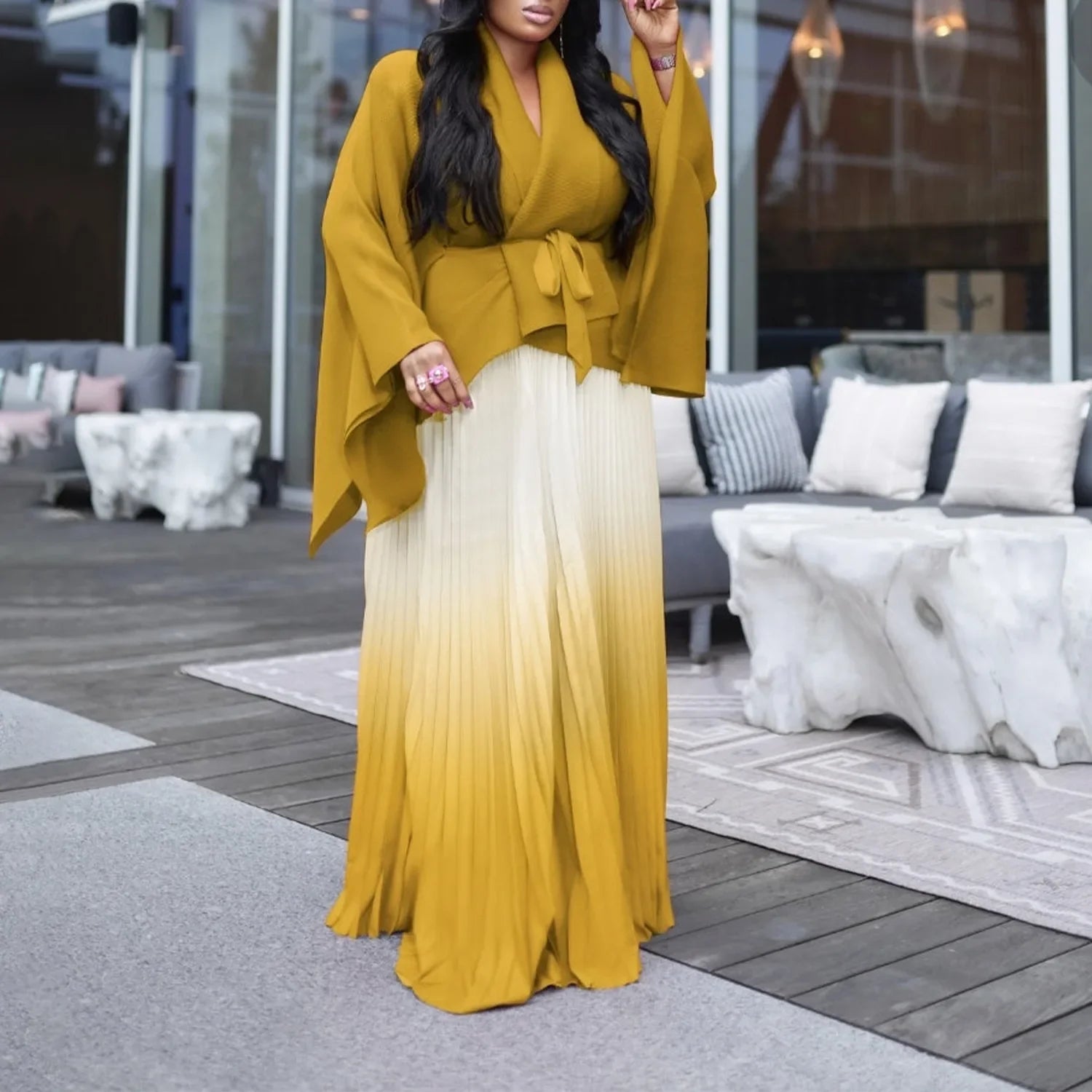 Chic women's two-piece outfit by CM.YAYA, perfect for middle-aged women, designed with a pullover closure and made from high-quality knitted polyester.