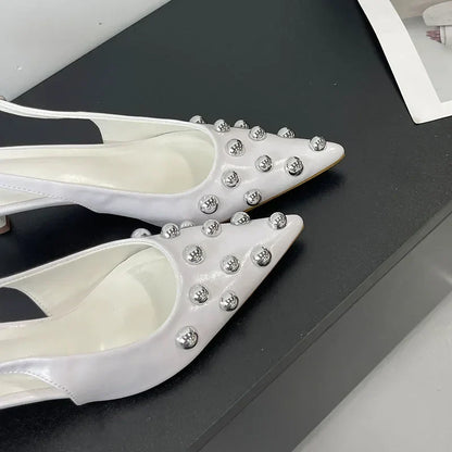 Fashion-forward women's sandals showcasing a sleek slip-on design and premium PU material for a luxurious feel.