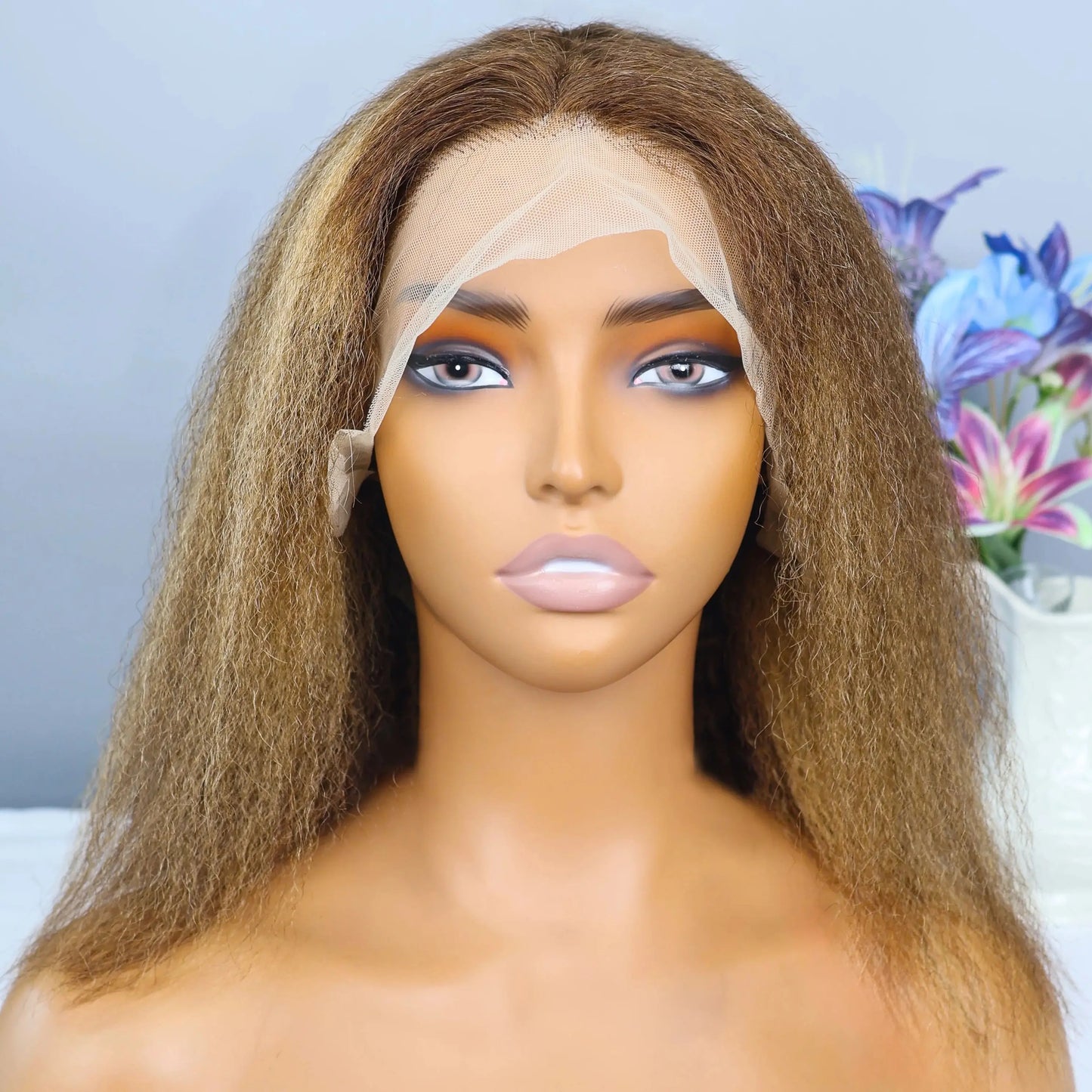 Elegant Swiss Lace Kinky Straight 13x4 Lace Frontal Wig, featuring a stylish short bob with beautiful brown and blonde highlights.