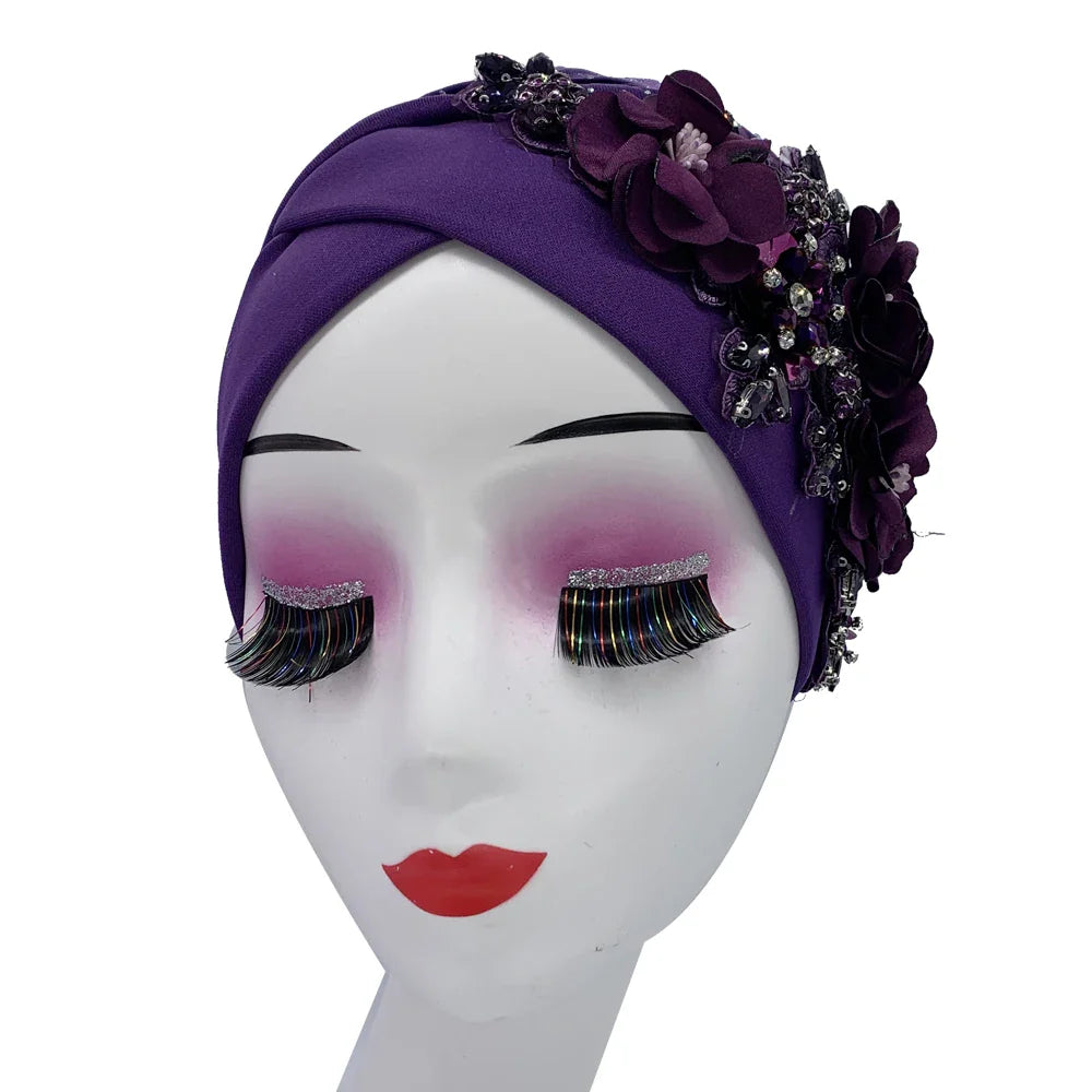 Luxury African hijab cap demonstrating intricate weaving techniques and adorned with diamond-like embellishments, suitable for middle-aged women.
