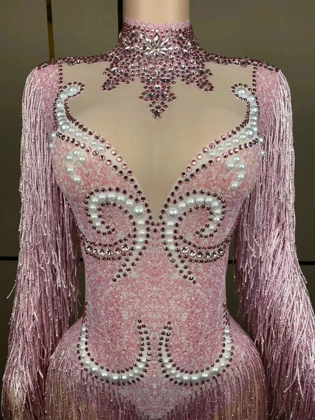 Stunning back view of luxury women's cha-cha dance practice suit, featuring a beautifully designed slim skirt and delicate pearl detailing.