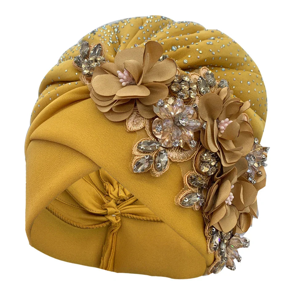 Chic women's head wrap, the African Turban Cap with gemstone detailing, designed for elegance and comfort, suitable for all seasons.