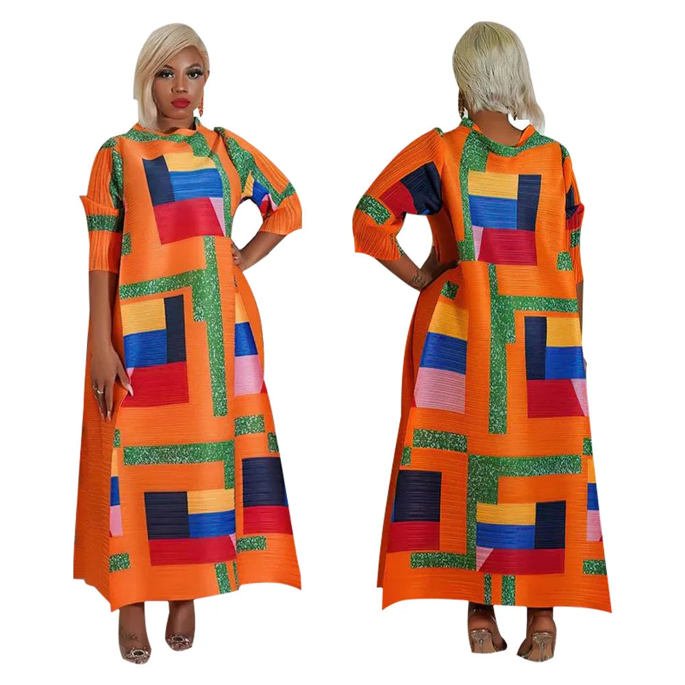 Elegant African plus size O-neck pleated long dress featuring three-quarter sleeves and vibrant traditional Dashiki patterns in luxurious fabric.