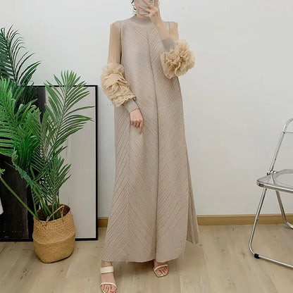 A luxurious view of the loose-waisted Maxi Dress with elegant petal sleeves and high stretch fabric, perfect for all-season wear, combining comfort with high-end fashion.