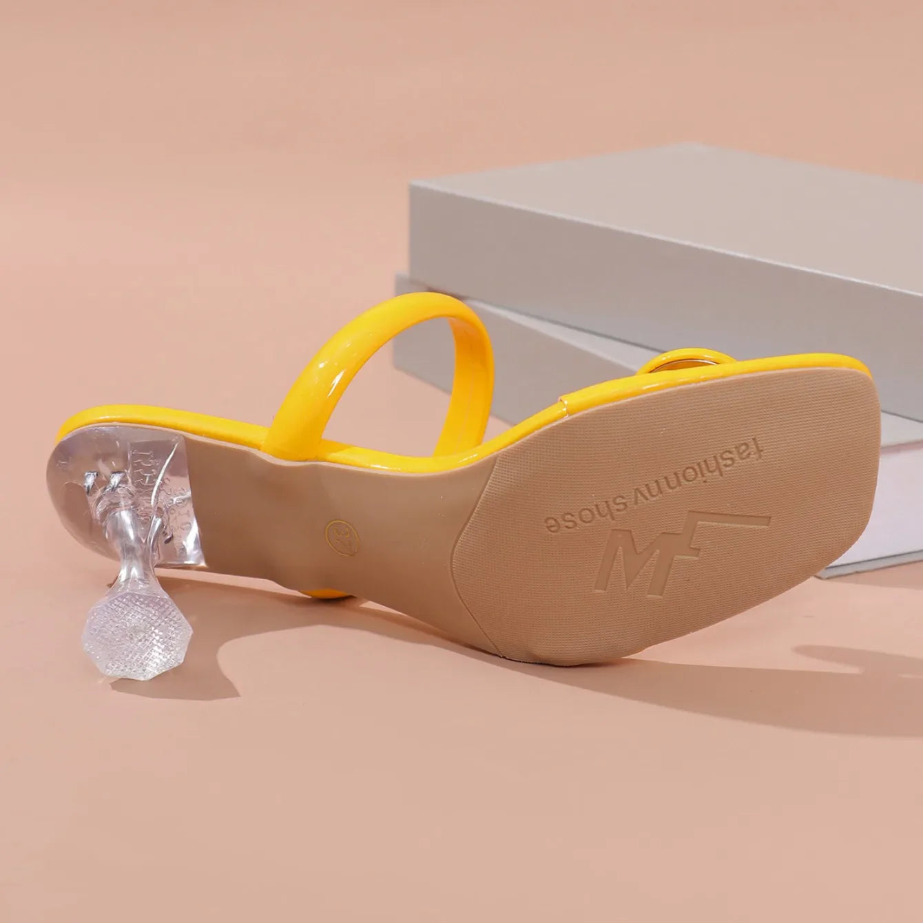 Stylish and trendy heeled sandals for women, featuring a delicate narrow band strap, perfect for enhancing any elegant ensemble.