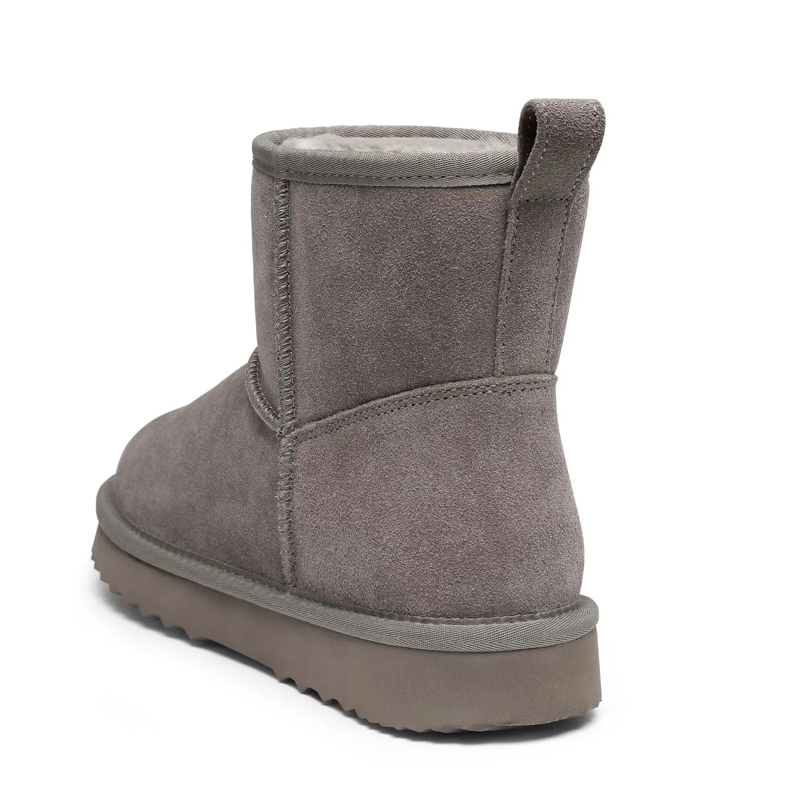 Stylish women's winter snow boots featuring a low square heel and round toe, offering both elegance and practicality.