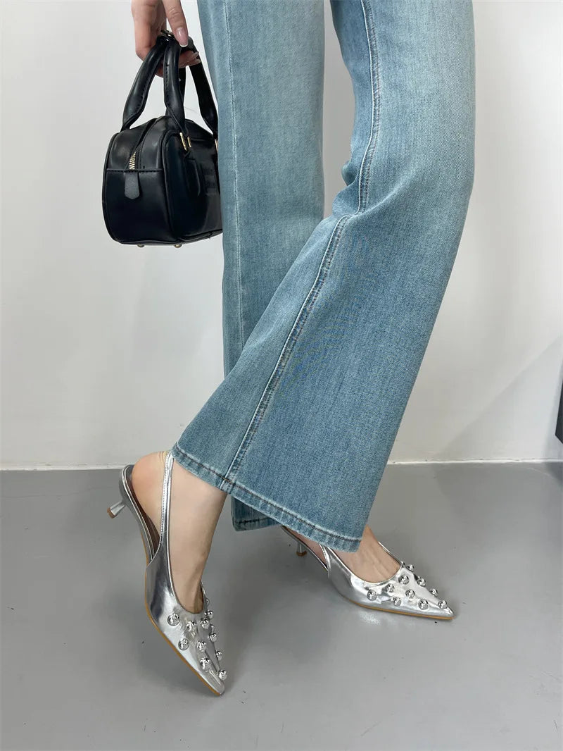 Stylish solid pattern high heeled sandals, expertly crafted for a perfect fit, reflecting the latest trends in women's fashion.