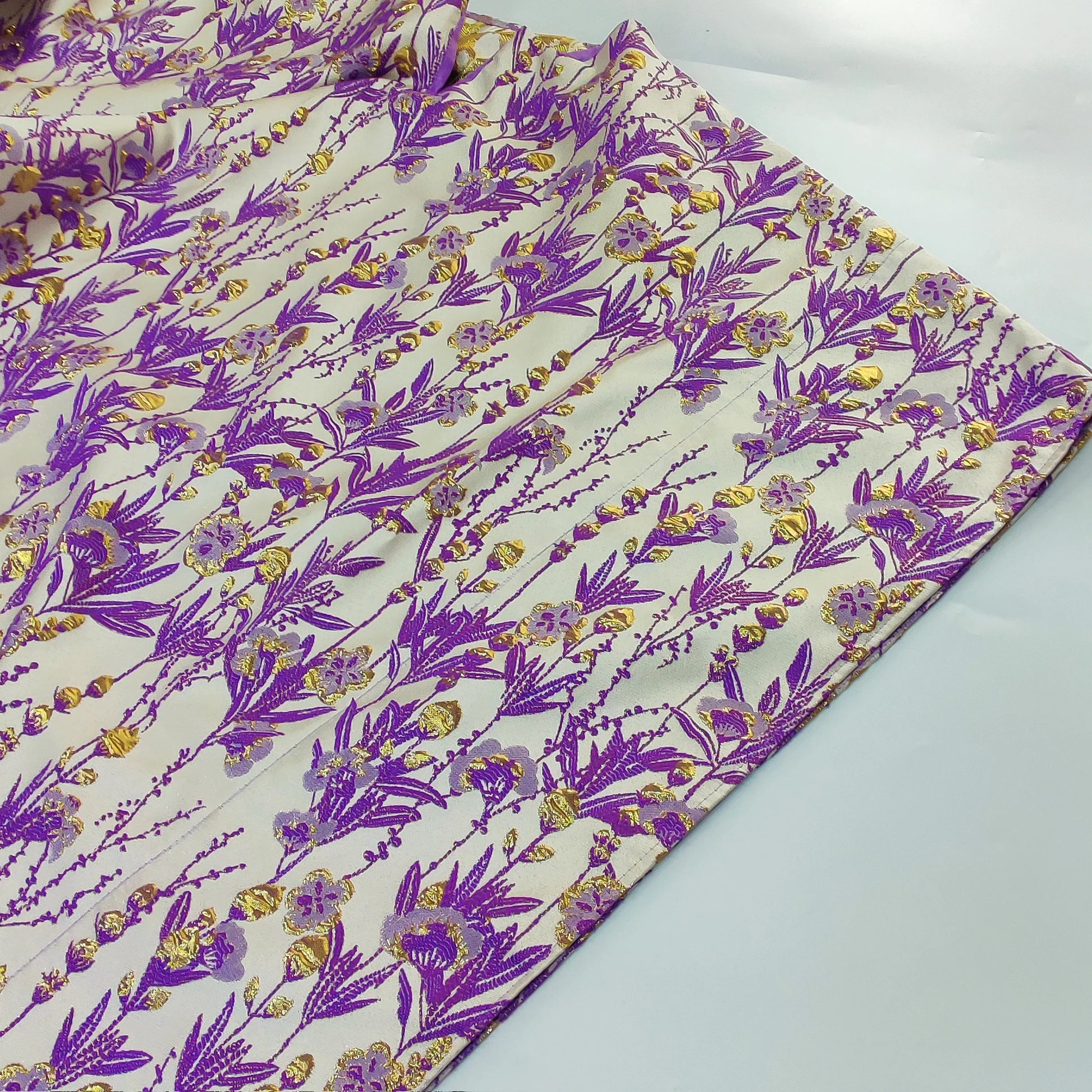 Stylish African Women Brocade Boubou Dress displayed in vibrant green and gold hues, ideal for traditional and modern occasions.