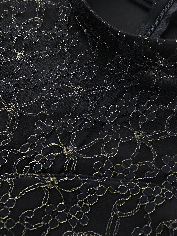 Stylish model wearing a black long high neck lace patchwork bodycon dress, perfect for evening events and clubs, available in sizes S to 4XL.