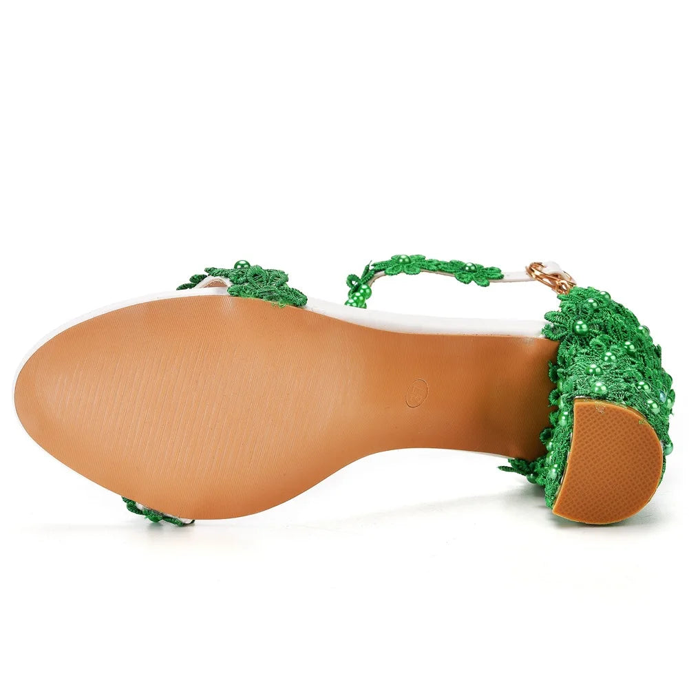 Elegant plus size women's gladiator sandals featuring high heels, adorned with delicate lace flowers and beads for a luxurious touch.