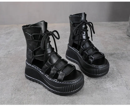 Close-up view of the exquisite cow leather texture and intricate hollow design of Koznoy Wedge Ankle Booties, embodying style and sophistication.