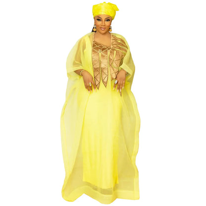 Sophisticated traditional African clothing worn by women, highlighting stunning embroidery details and pullover closure style.