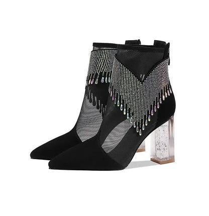 Chic women's high heel dance boots in black adorned with shimmering rhinestones, featuring rubber sole for enhanced grip, ideal for fashionable dance floors.