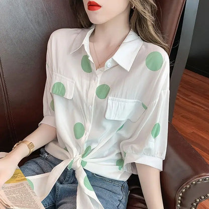 Chic half sleeve blouse for women designed with a modern polka dot pattern and a sophisticated bandage bow, ideal for casual events.