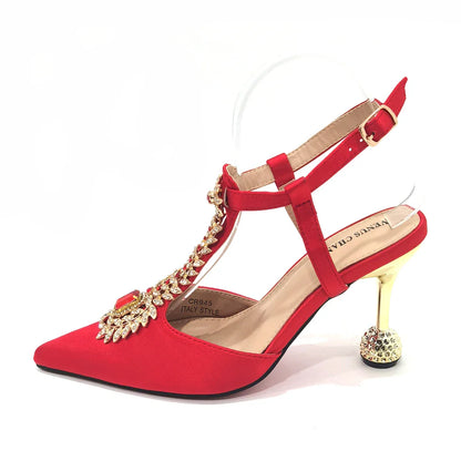 Fashionable red pointed toe pumps with thin heels, designed for women who appreciate elegance and style.