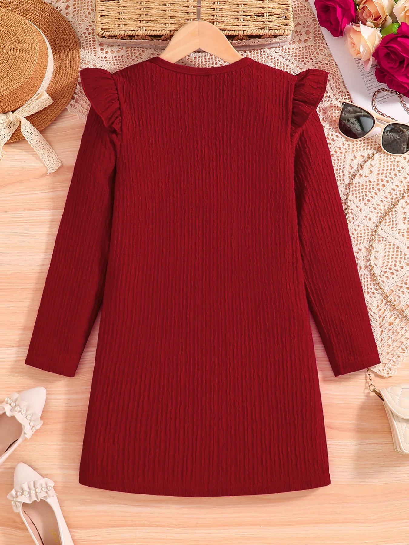 Luxury girl's autumn casual knitted dress in vibrant red, featuring a knee-length design and stylish O-neck with a cute bow decoration, perfect for ages 7-13.