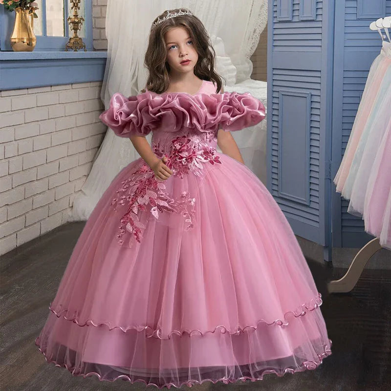 Elegant girls' long evening dress, featuring stunning embroidered mesh, adorned with pearls, perfect for special occasions. Available in sizes 4-13 years.