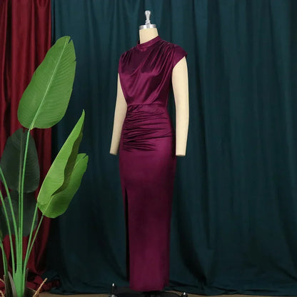 Luxurious Burgundy Bodycon Dress featuring stylish folds, ideal for creating a chic silhouette for special occasions.