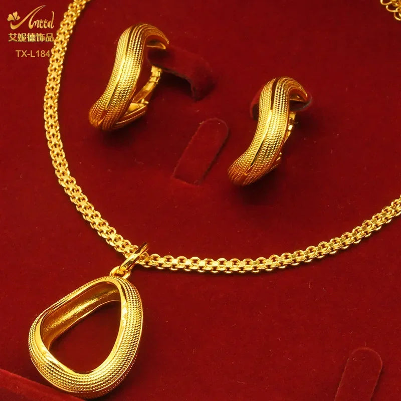 Close-up view of rhinestone accents on a 24K gold-plated copper necklace, showcasing its exquisite craftsmanship and style.