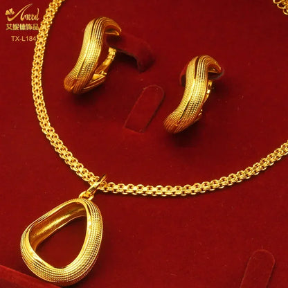 Close-up view of rhinestone accents on a 24K gold-plated copper necklace, showcasing its exquisite craftsmanship and style.