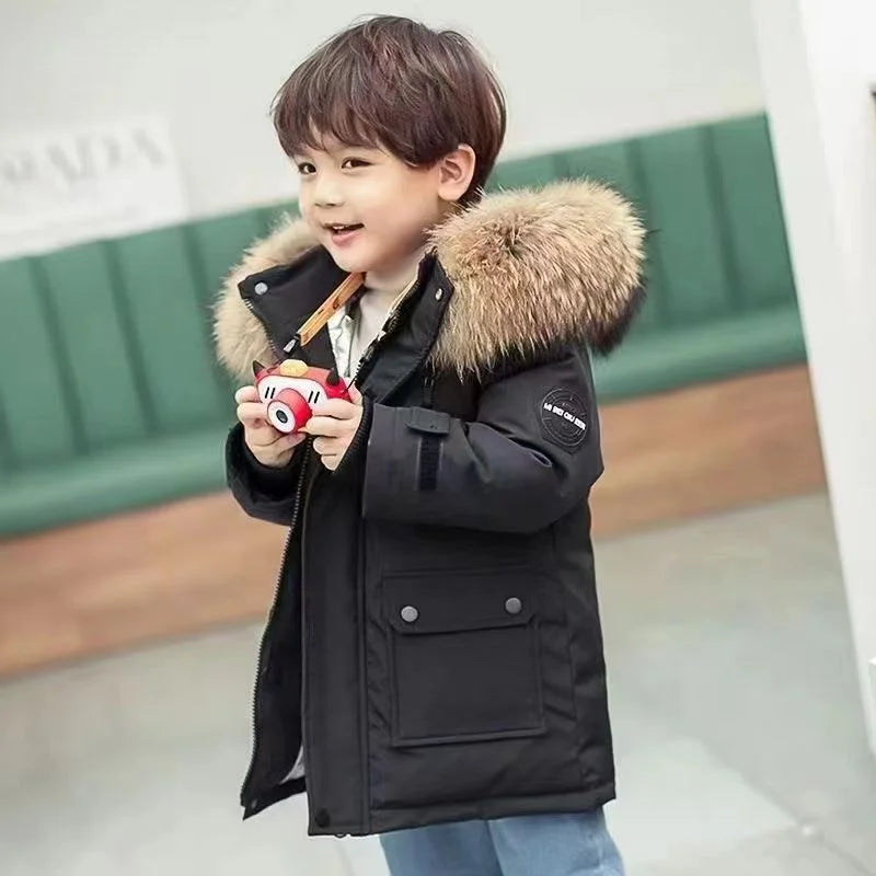 Chic unisex winter coat for boys and girls, showcasing a fashionable fur-trimmed hood, suitable for ages 5-12 years.