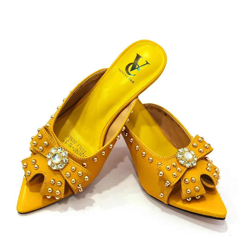 Gorgeous matching handbag set designed for women, crafted to match stylish high heeled shoes, exuding elegance and sophistication.