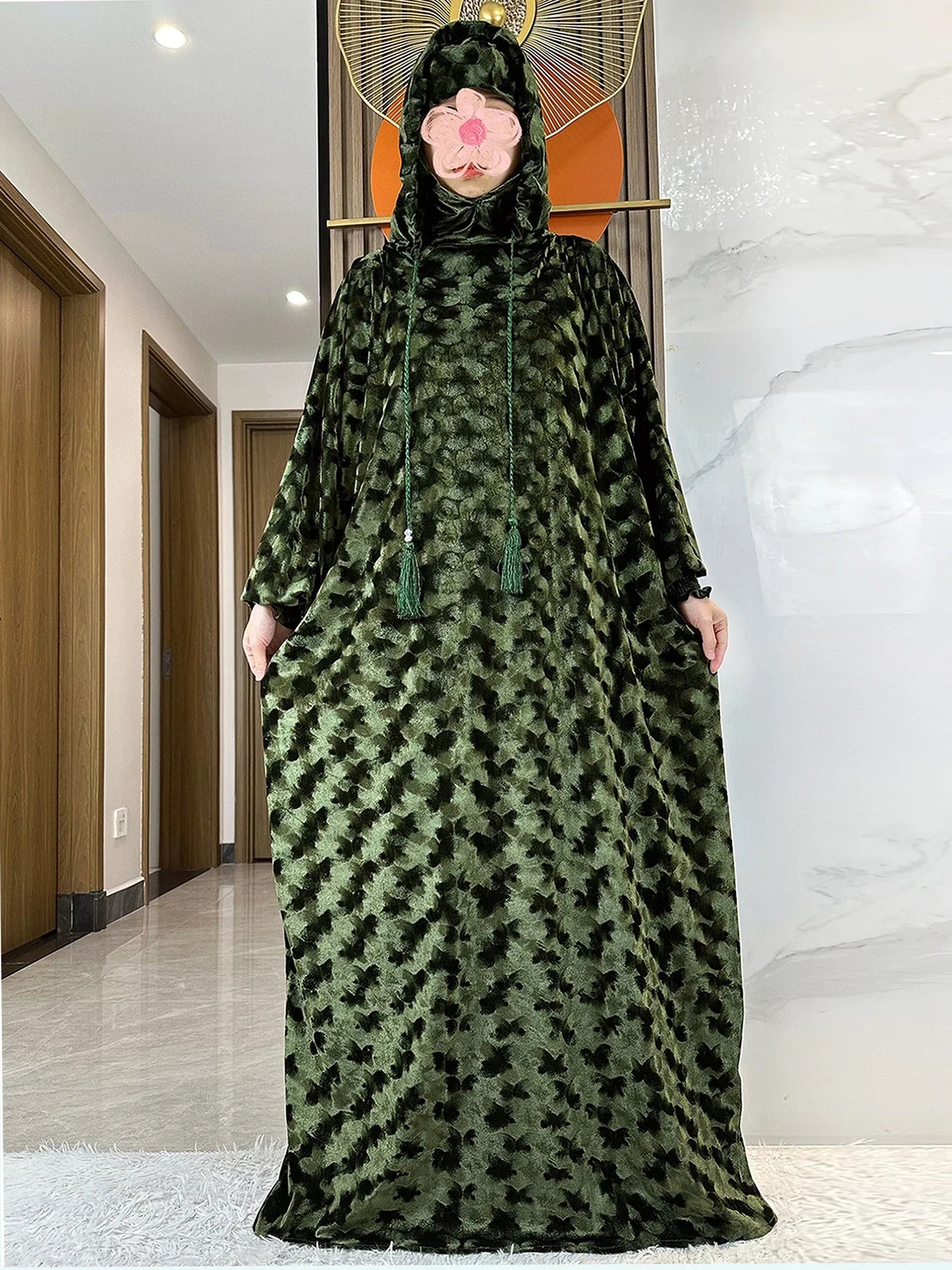 A beautiful arrangement of the luxury velvet Muslim Abaya in standard thickness, showcasing its modest design and versatility for various occasions.
