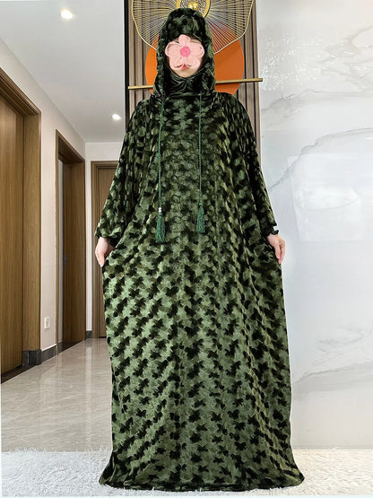 A beautiful arrangement of the luxury velvet Muslim Abaya in standard thickness, showcasing its modest design and versatility for various occasions.