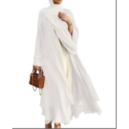 Stunning women's dashiki robe in vibrant print, highlighting luxurious craftsmanship and cultural heritage, ideal for special events and gatherings.