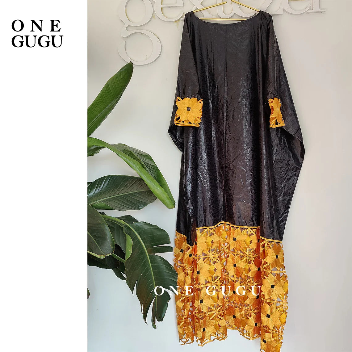 Long sleeve dashiki gown designed for women, made from high-quality cotton and polyester fabric in an opulent gold and white colour scheme.