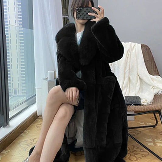 Luxurious women's plus size thick faux fox fur jacket in elegant black, perfect winter outerwear for cold weather.
