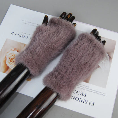 Fashionable Women's Half Finger Gloves in genuine mink fur, designed for style and comfort in cold weather.