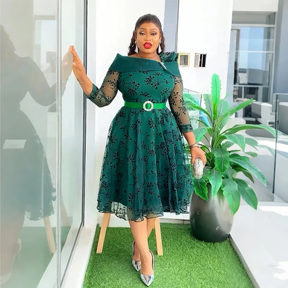 Elegant plus size African maxi dress for women, featuring a vibrant Muslim print, perfect for evening parties or special occasions.