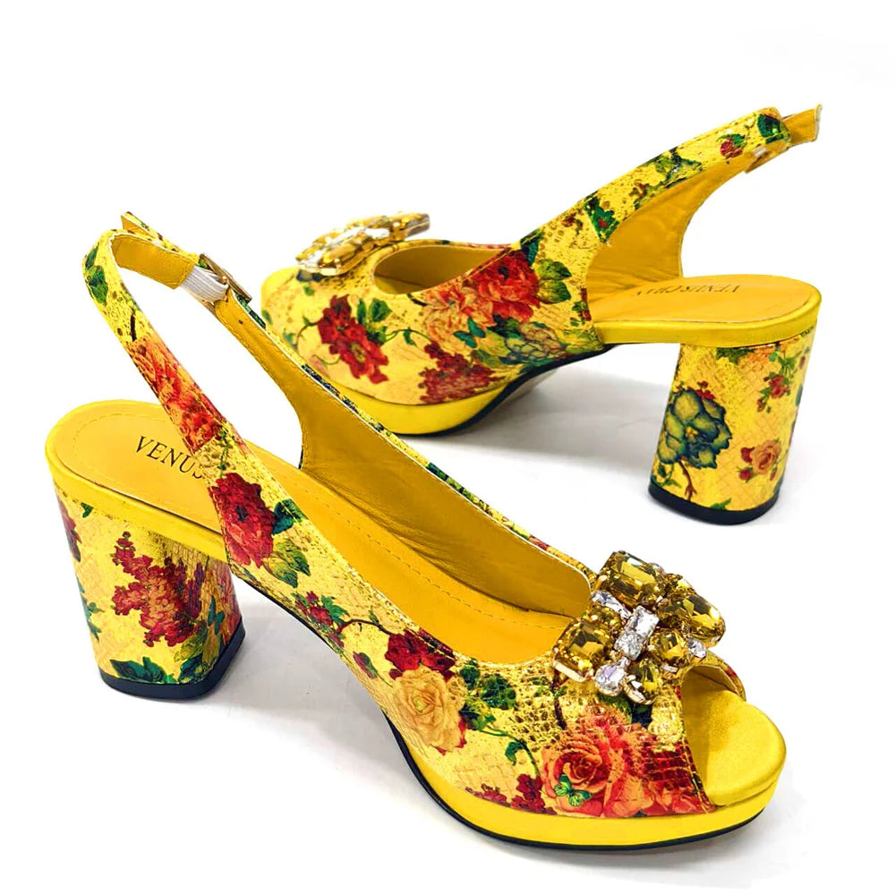 Sophisticated ensemble of Venus Chan gold sandals and matching bag, designed for women who appreciate luxury and comfort.