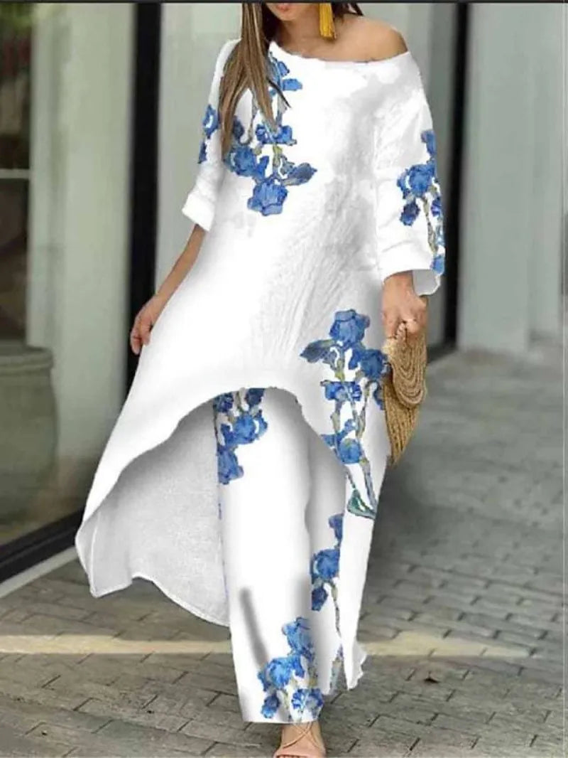 Exquisite women's luxury spring/summer two-piece set featuring a casual loose irregular printed round neck shirt and high waist wide leg pants, elegantly designed for the modern woman.