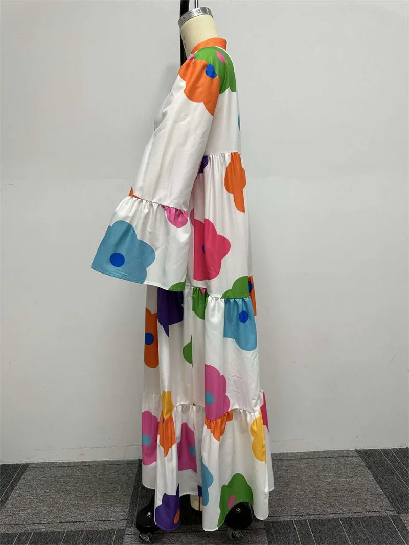 Detail of the floral pattern on an elegant long sleeve shirt dress, highlighting the sophisticated and fashionable features suitable for spring and summer.