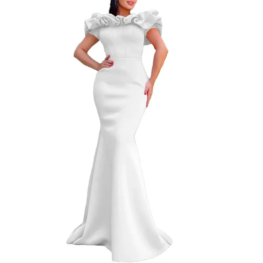 Glamorous solid colour mermaid dress showcased on a model, accentuating the flattering silhouette ideal for glamorous occasions.