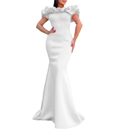 Glamorous solid colour mermaid dress showcased on a model, accentuating the flattering silhouette ideal for glamorous occasions.