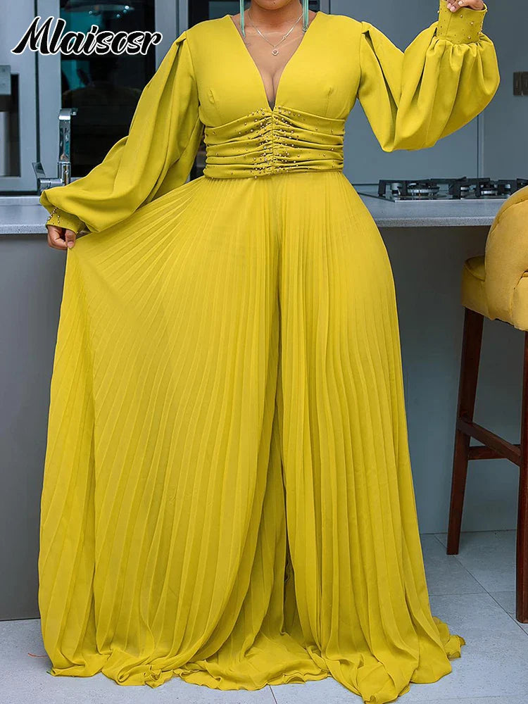 Chic full-length jumpsuit by Mlaiscsr in a solid colour, showcasing embroidered flares and crafted from soft polyester, ideal for middle-aged women seeking comfort and elegance.