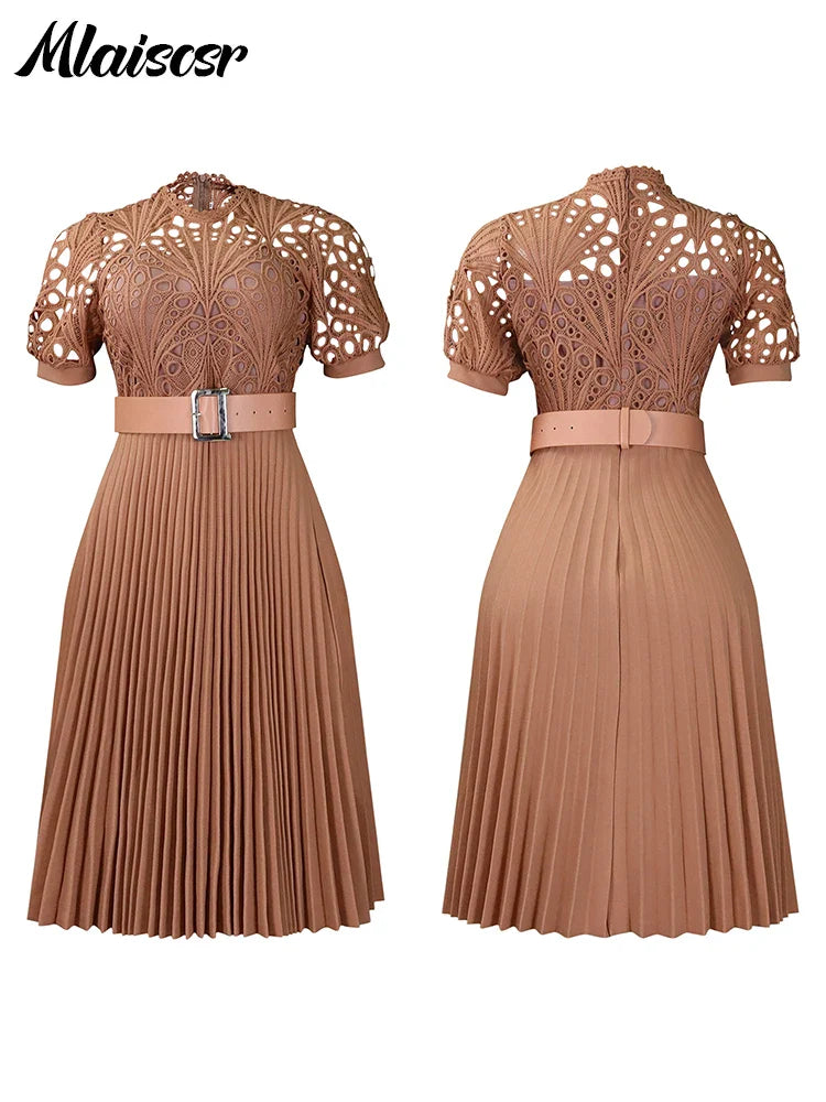 Back view of the Mlaiscsr Luxury Pleated Dress highlighting its flattering silhouette and sleek zipper closure.