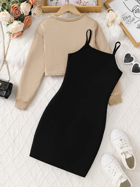 Chic girls' casual dress set featuring a stylish hip skirt and short top, perfect for ages 8-12, crafted from luxurious solid polyester.